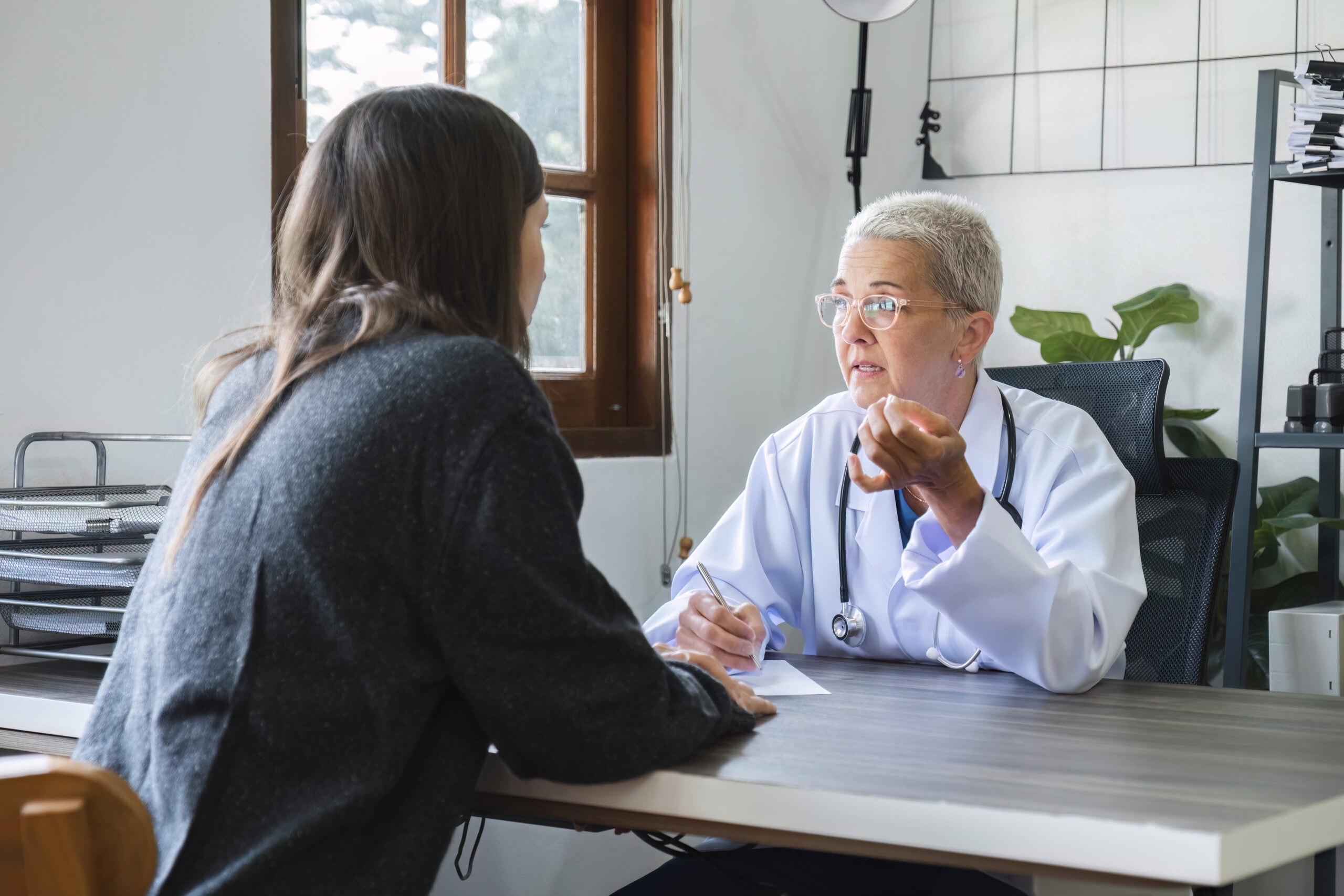 A consultation between a doctor and a patient.